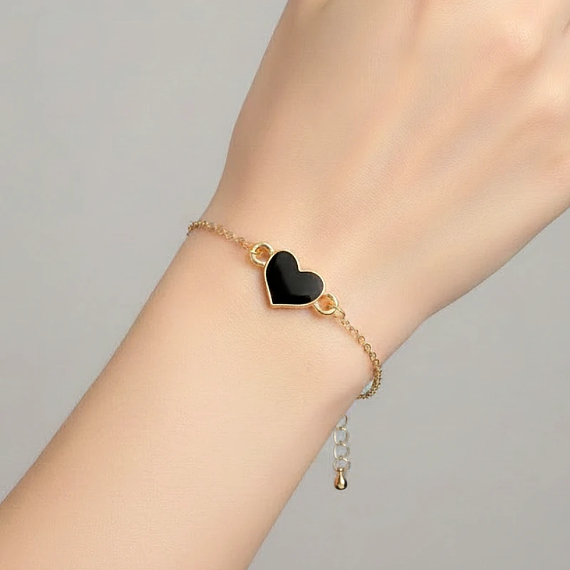 gold-tone-black-enamel-heart-charm_1320_hgs8.webp