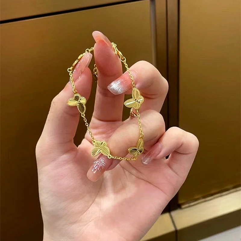 Gold-Tone Textured Butterfly Station Chain Bracele