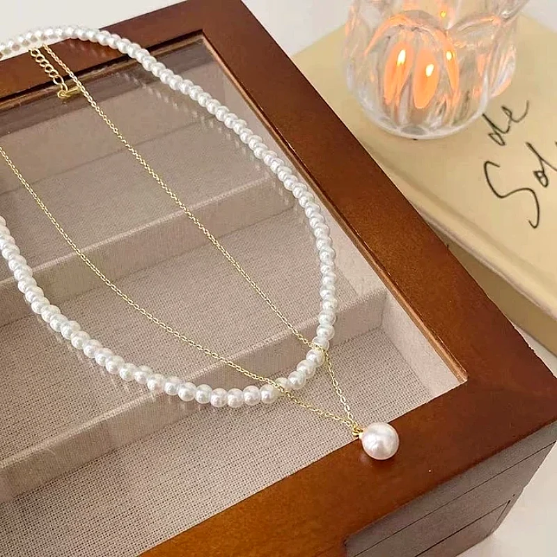 layered-pearl-pendant-necklace_1320_ctk9.webp