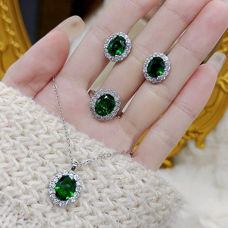 Silver-Tone Emerald Green Oval Crystal Halo set