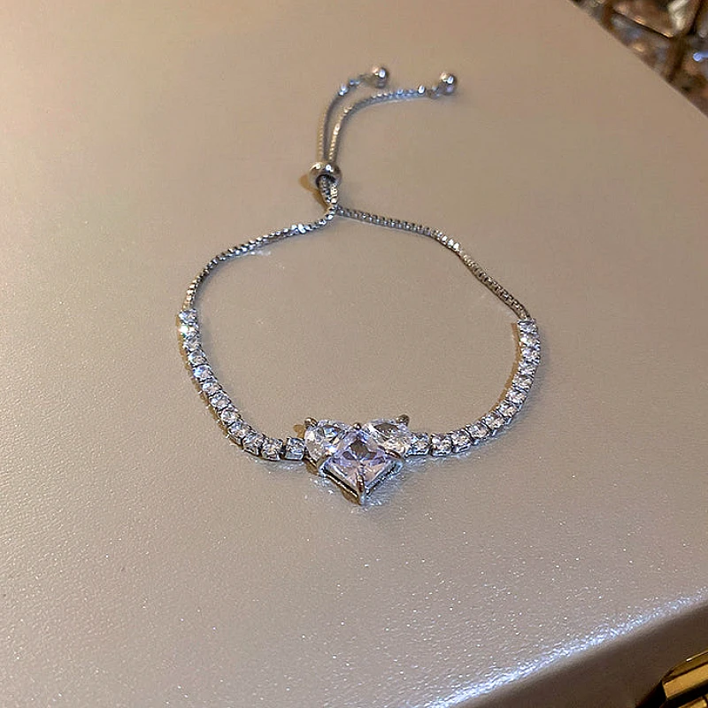 Silver-Tone Sparkling Crystal Heart Tennis Bolo Br
